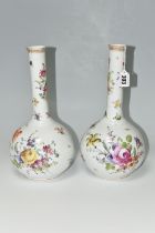 A PAIR OF PFVA DRESDEN STYLE ONION SHAPED VASES HAND PAINTED WITH DEUTCHE BLUMEN, gilt rims, painted