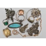 A BAG OF ASSORTED JEWELLERY, to include a silver open work brooch, set with a central smoky