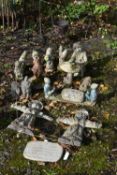 A LARGE SELECTION OF WEATHERED COMPOSITE GARDEN FIGURES, to include two scarecrows, various