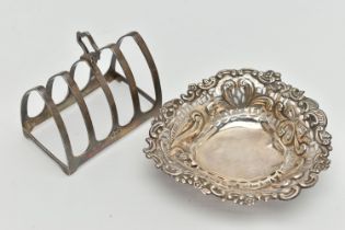 A LATE VICTORIAN SILVER DISH AND A TOAST RACK, the heart shape bonbon dish with scrolling decoration