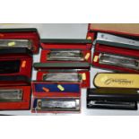 A GROUP OF TEN CASED HOHNER HARMONICAS, comprising The 64 Chromonica professional model, a CX12, a
