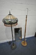 A TIFFANY STYLE STANDARD LAMP, with a cream and foliate decorated shade, on a metal support and
