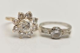 TWO 9CT GOLD CUBIC ZIRCONIA SET RINGS, the first a circular cluster design, the second a three stone
