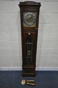 A 20TH CENTURY OAK LONGCASE CLOCK, the brass and silvered 10 inch dial with Roman numerals, two