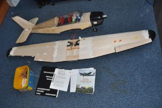 A PIPER CHEROKEE MODEL PLANE, 64in wingspan partially built with spares, manuals and plans (