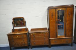 A 20TH CENTURY OAK THREE PIECE BEDROOM SUITE, to include a wardrobe, with a single mirrored door, on