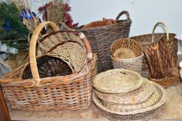 A COLLECTION OF WICKER BASKETS, approximately twenty pieces, different shapes, styles and sizes,