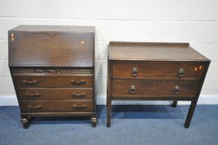 A 20TH CENTURY OAK BUREAU, the fall front door enclosing a fitted interior, above three drawers,