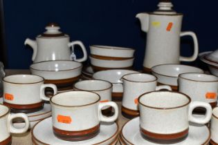 A TWENTY EIGHT PIECE DENBY 'POTTER'S WHEEL (TAN CENTRE)' BREAKFAST SET, comprising a teapot, a