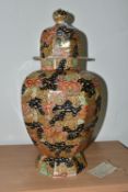 A MASON'S IRONSTONE 'BANDANA' WARE COVERED VASE, of octagonal baluster form, having an orange lustre