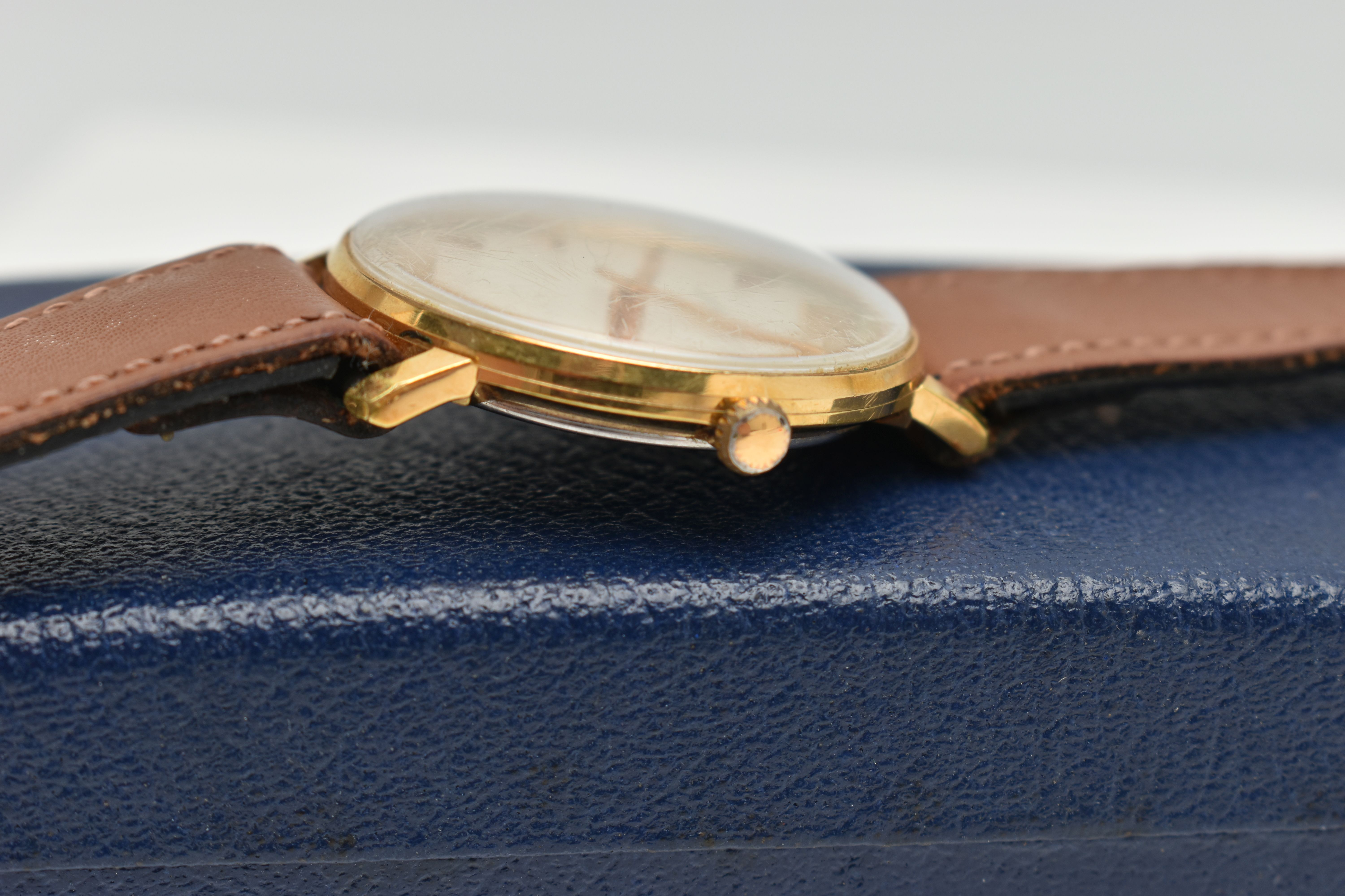 A 'GARRARD' WRISTWATCH, hand wound movement, round dial signed 'Garrard', baton markers, gold plated - Image 6 of 6