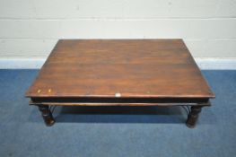A RECTANGULAR HARDWOOD COFFEE TABLE, with metal studs and mounts, length 136cm x depth 91cm x height