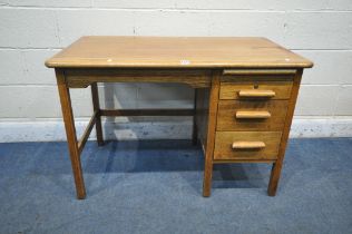 A 20TH CENTURY OAK ABBESS DESK, with a brushing slide, above three drawers, length 107cm x depth