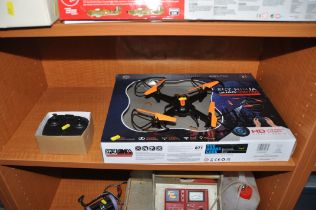 A SKY NINJA QUAD COPTER with original box and controller (untested but looks pretty new)