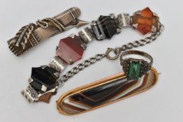 A SCOTTISH AGATE BRACELET AND BROOCHES, the white metal designed as a series of five carved agate