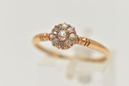 AN EARLY 20TH CENTURY 18CT GOLD DIAMOND RING, designed as a central old cut diamond surrounded by