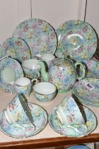 EIGHTEEN PIECES OF SHELLEY 'MELODY' CHINTZ PATTERN TEA WARES, comprising a small tea pot, small milk