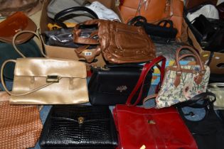 FOUR BOXES OF HANDBAGS AND HATS, over thirty hand bags, maker's names include Tule, Liz