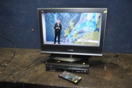 A PANASONIC VIERA TX-26LMD70A 26in TV with remote and a Panasonic DMR-EZ49v DVD video player with