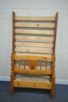 A MODERN PINE SINGLE BEDSTEAD, with side rails, slats and bolts (condition report: one slat snapped,