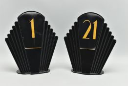TWO MODERN ART DECO STYLE TABLE MARKERS, black plastic, paper labels numbered 1 and 21, height 21.