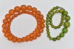 TWO EARLY TO MID 20TH CENTURY BAKELITE BEAD NECKLACES, the first a single row of circular orange
