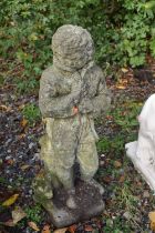 A WEATHERED COMPOSITE GARDEN FIGURE OF A BOY, height 77cm (condition report: weather condition)