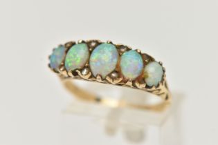 A LATE VICTORIAN OPAL AND DIAMOND RING, designed as a line of five graduated oval opal cabochons