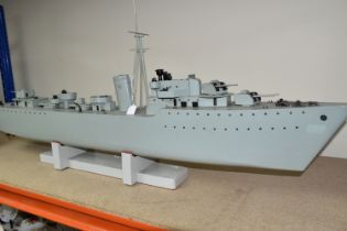 A MOTORISED MODEL DESTROYER, the scratch built ship with brass hull, covered motor compartment and