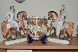A PAIR OF VICTORIAN STAFFORDSHIRE FIGURES AND A LATE NINETEENTH CENTURY PLANTER, the Staffordshire