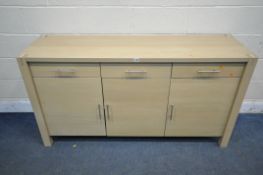 A MODERN LIGHT OAK EFFECT SIDEBOARD, with three drawers over three cupboard doors, length 160cm x