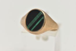 A GENTS 9CT GOLD SIGNET RING, of an oval form, set with an onyx inlay with malachite detail,