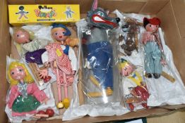 A BOX OF PELHAM PUPPETS, seven puppets comprising Cowboy, Dutch Girl, Wolf, Pinocchio, Bengo and two