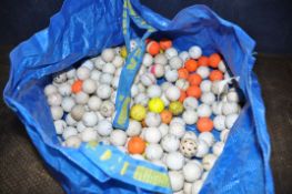 A LARGE BAG CONTAINING A QUANTITY OF USED GOLF BALLS by Top Flite, Pinnacle, Slazenger, Titleist,