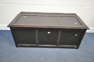 A STAINED WOOD PANELLED BLANKET CHEST, with a hinged lid, width 116cm x depth 55cm x height 48cm (