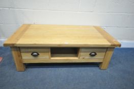 A MODERN SOLID LIGHT OAK COFFEE TABLE, with two drawers, length 121cm x depth 60cm x height 41cm (