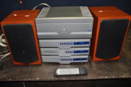 A QUAD 909 COMPONENT HI FI SYSTEM, comprising of a 909 amplifier, a 99 Pre amp, a CD player, Tuner