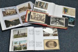 FOUR POSTCARD ALBUMS containing approximately 555 miscellaneous postcards from the early - mid