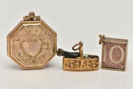 TWO 9CT GOLD CHARMS AND A LOCKET, the first charm designed as a 9ct gold basket containing a wine
