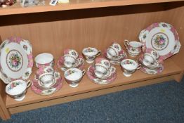 A THIRTY FOUR PIECE ROYAL ALBERT 'LADY CARLYLE' TEA SET, comprising two cake plates, a cream jug,