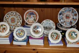 A COLLECTION OF WEDGWOOD COLLECTORS PLATES, comprising twenty four mostly boxed plates: four