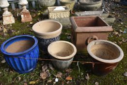 FOUR VARIOUS GLAZED PLANT POTS, of various sizes, largest plant pot diameter 32cm x height 29cm,