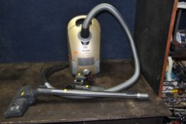 A MIELE S4 GOLD EDITION VACUUM CLEANER with accessories (PAT pass and working)