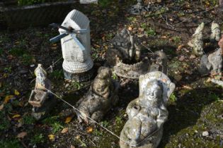 FOUR VARIOUS WEATHERED COMPOSITE GARDEN FIGURES/ITEMS, to include two windmills, three gnomes, and a
