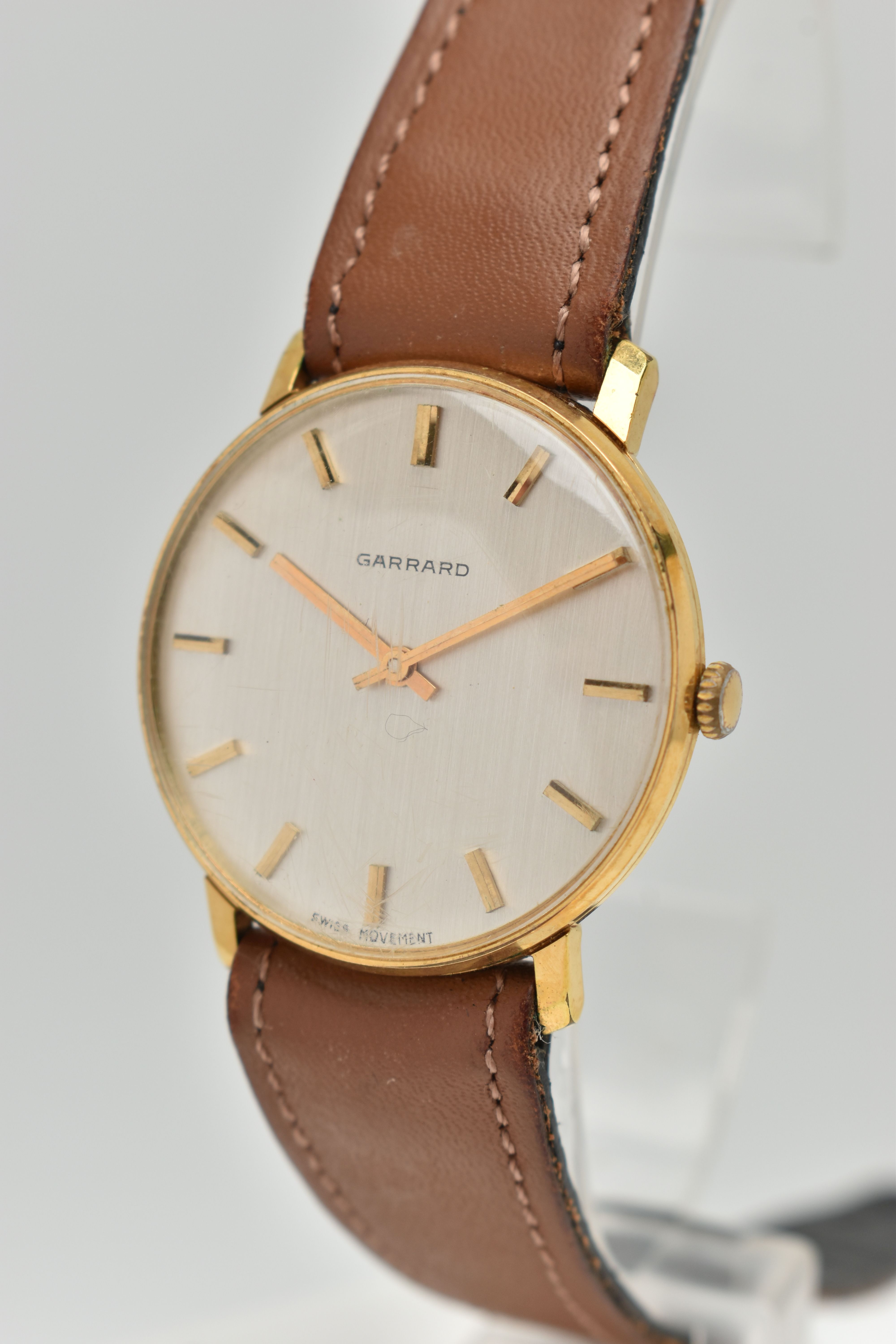 A 'GARRARD' WRISTWATCH, hand wound movement, round dial signed 'Garrard', baton markers, gold plated - Image 2 of 6