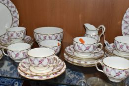A THIRTY SIX PIECE EARLY TWENTIETH CENTURY MINTON TEA SET, pattern no S50, printed and tinted with