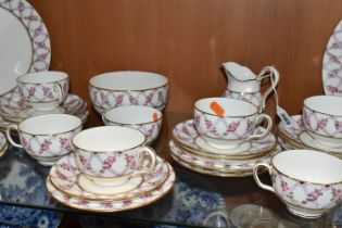 A THIRTY SIX PIECE EARLY TWENTIETH CENTURY MINTON TEA SET, pattern no S50, printed and tinted with