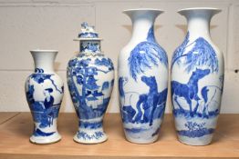 FOUR 19TH CENTURY CHINESE PORCELAIN BLUE AND WHITE VASES, comprising a pair of baluster vases with