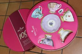 A BOXED SET OF ROYAL ALBERT CUPS AND SAUCERS, to commemorate one hundred years of English
