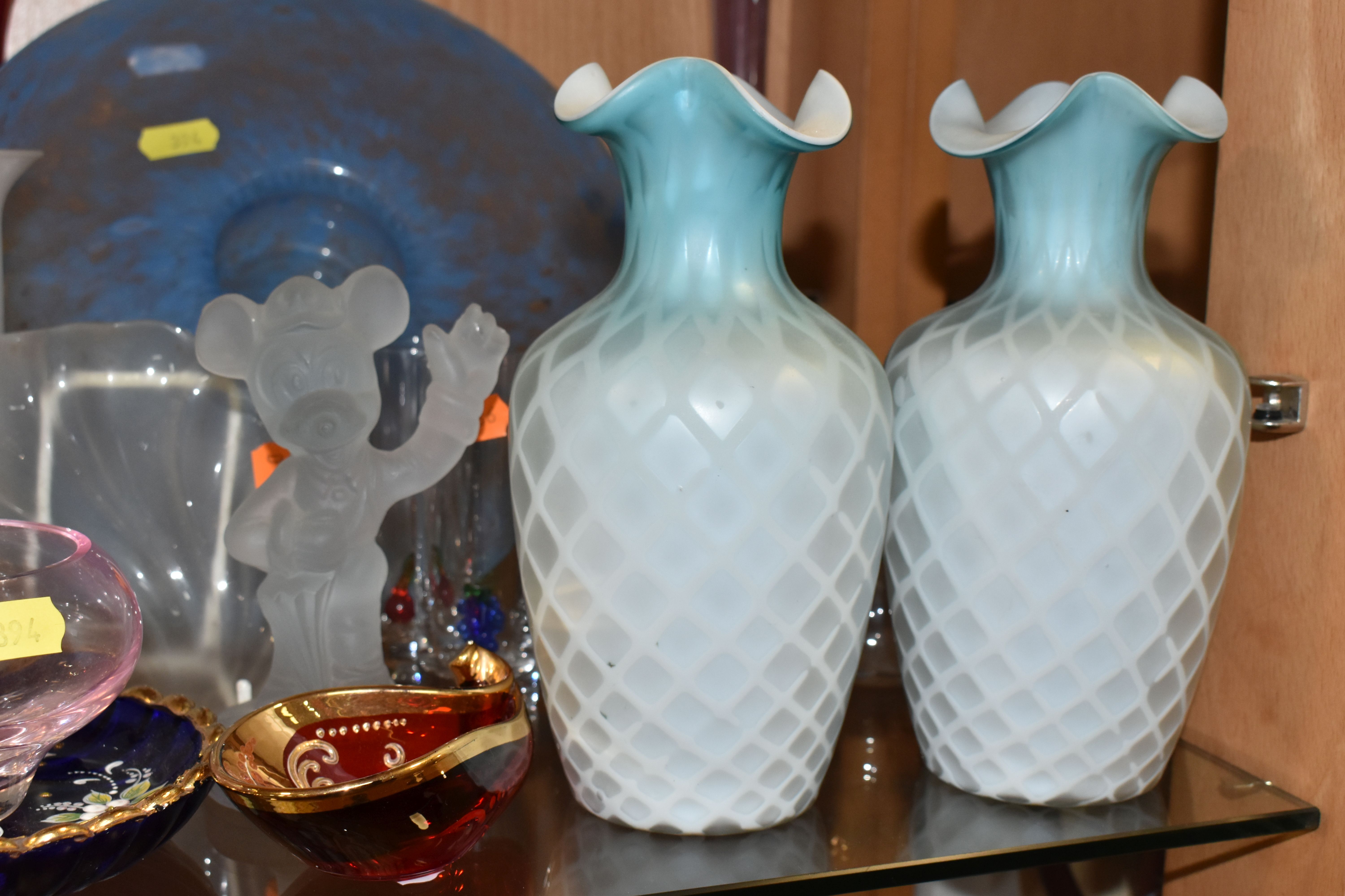 A COLLECTION OF COLOURED GLASSWARE, comprising two pale blue satin quilted air - trap vases, - Image 7 of 13